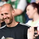 All smiles from former Hibs captain Rob Jones as he takes his seat amongst the away fans for the Premiership play-off match against Hamilton in 2014. Pic: SNS Group Craig Williamson