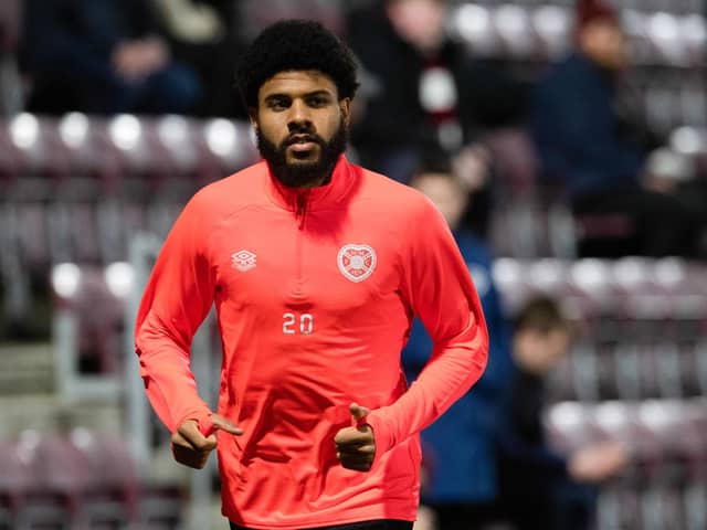 Hearts' new signing Ellis Simms warms up prior to kick-off against Celtic.