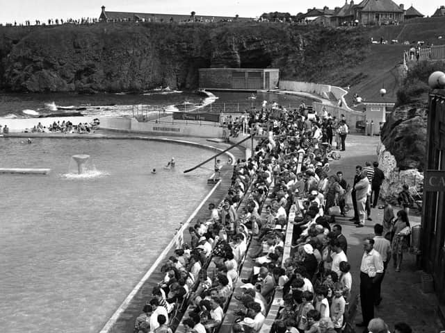 Crowds of holidaymakers gather at the town's open-air pool for the Miss Dunbar beauty contest in July 1966.