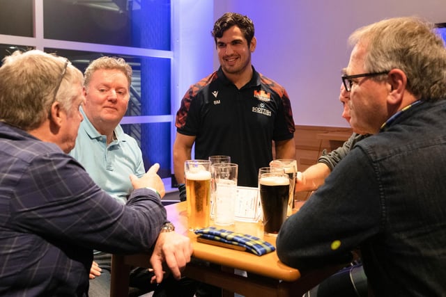 McInally speaks to fans in the Cap and Thistle suite after Edinburgh's match against Munster in December