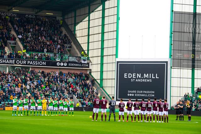 Hibs and Hearts players line-up in front of a packed Easter Road before the Edinburgh derby on September 22, 2019.