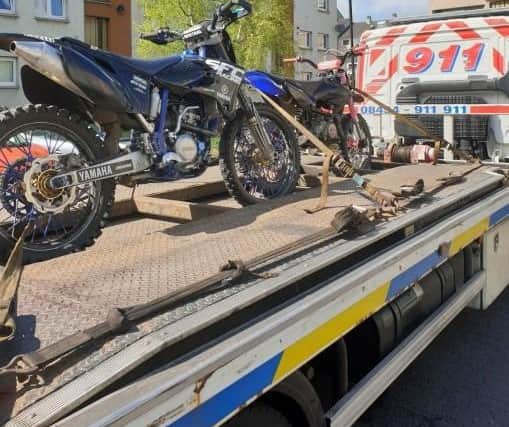 Police confiscated the off-road motorbikes after spotting two people driving them on footpaths in Wester Hailes.