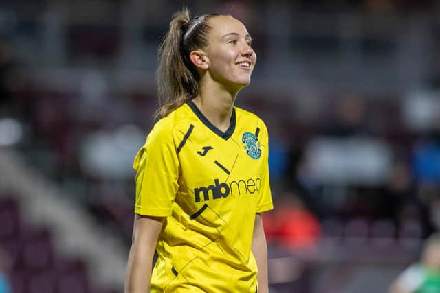 Hibs goalkeeper Emily Mutch is all smiles after saving a penalty in the SWPL1 derby against Hearts at Tynecastle. Picture: Thomas Brown