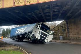 There is traffic chaos at Cameron Toll after a lorry hit a railway bridge
