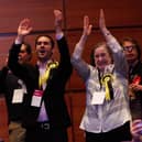 SNP group leader Adam McVey (centre) celebrates as one of the results is announced at the election count on Friday.  Photo: Scott Louden
