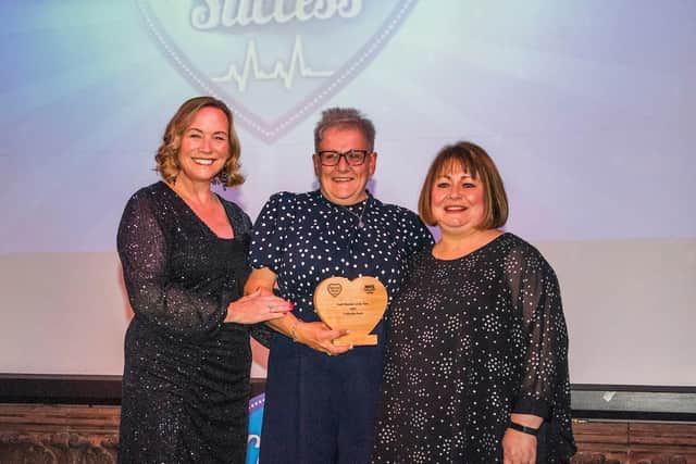 Arlene Stuart, Catherine Scott and Janis Butler celebrating this years Staff Member of the Year Award