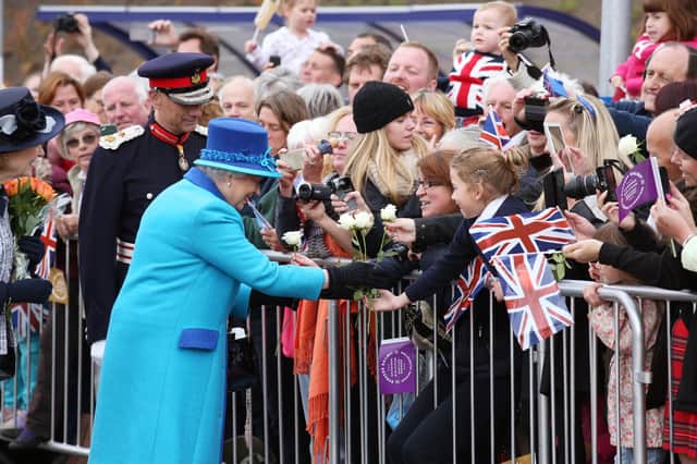 Queen Elizabeth greets well-wishers in Newtongrange on the day she became Britain's longest reigning monarch in 2015 (Picture: Andrew Milligan/WPA pool/Getty Images)