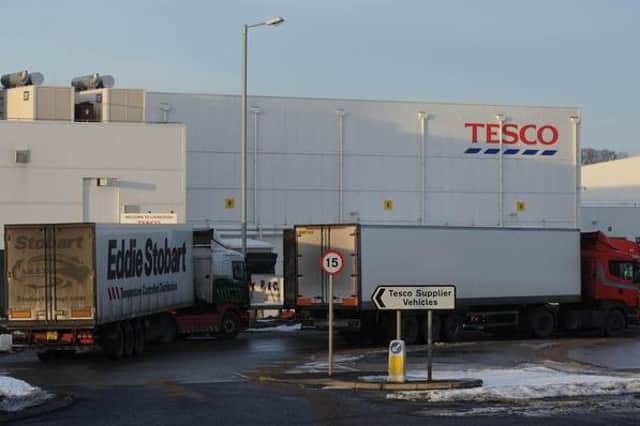 Workers at Europe's largest Tesco distribution centre, in Livingston, have voted for industrial action.