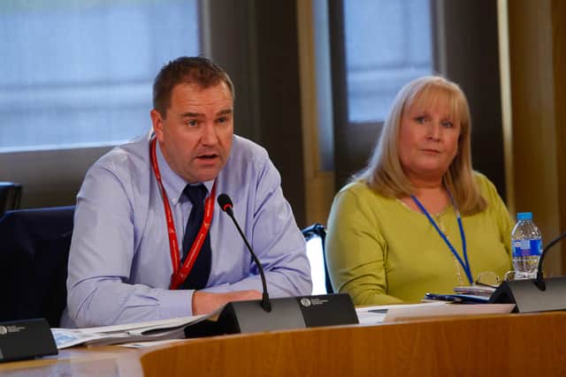 Neil Findlay with mesh campaigner Elaine Holmes at the Scottish Parliament    Photograph: Scott Louden