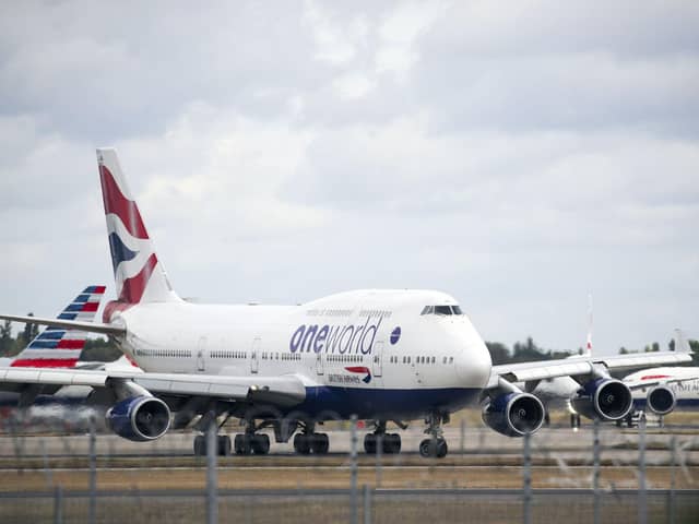 The parent company of British Airways expects its flight capacity from October to December to be no more than 30 per cent of what it was over the same period last year. This is down from its previous guidance. Picture: Steve Parsons/PA Wire