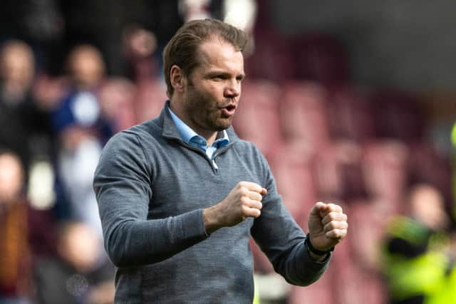 Robbie Neilson was delighted as Hearts beat Hibs.