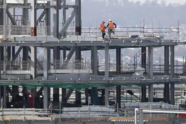 Two construction industry bodies have joined calls for the sector to ensure payments are made to hard-pressed businesses on time and prevent a jobs bloodbath. Picture: Jane Barlow/PA Wire