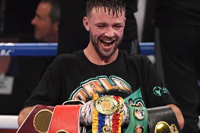 Josh Taylor poses with his title belts after his win by unanimous decision over Jose Ramirez in Las Vegas on May 22, 2021 (Photo by David Becker/Getty Images)