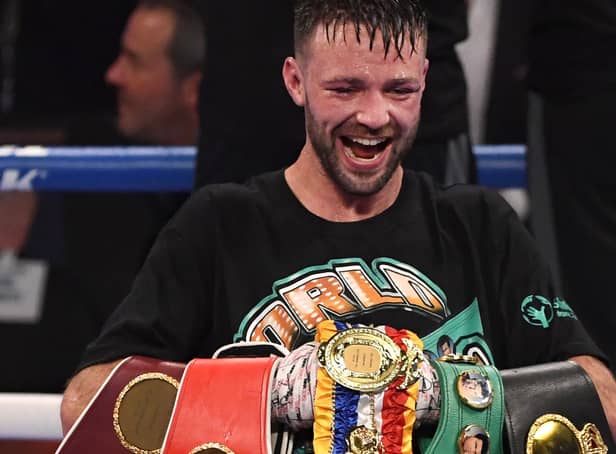 Josh Taylor poses with his title belts after his win by unanimous decision over Jose Ramirez in Las Vegas on May 22, 2021 (Photo by David Becker/Getty Images)