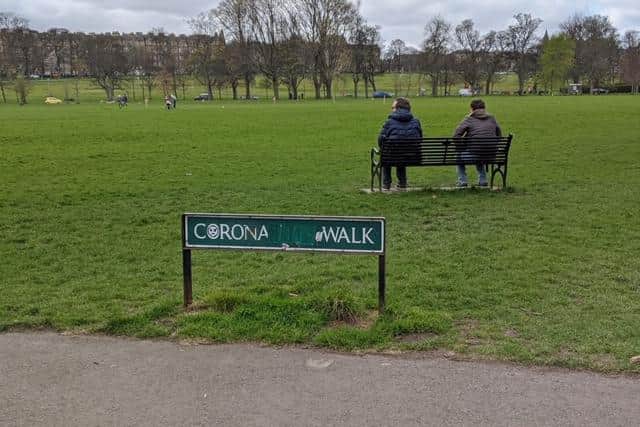 The Coronation Walk street sign has been altered to reflect current life in Edinburgh. Pic: Jenny Bruce