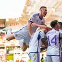 Scotland players celebrate with goalscorer Lyndon Dykes after the equaliser against Norway in Oslo on Saturday. Picture: Getty