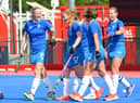 Sarah Jamieson (second left) receiving congratulations from her team-mates after scoring for Scotland v Italy at Peffermill. Picture: Nigel Duncan