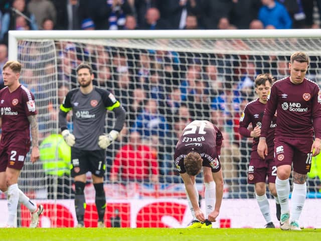 The dejected Hearts players look on during the 2-0 defeat by Rangers at Hampden.