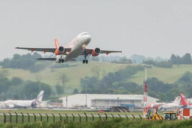 A drunk thug who caused an aircraft to be diverted to Edinburgh Airport after he began 'eating'his mobile phone is facing a jail sentence. Pic: Ian Georgeson Copyright: jpimedia