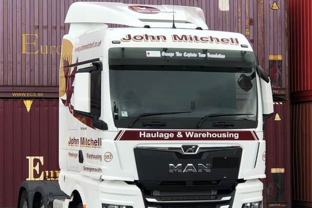John Mitchell Haulage and Warehousing in Grangemouth has named its latest fleet addition after Captain Sir Tom Moore.