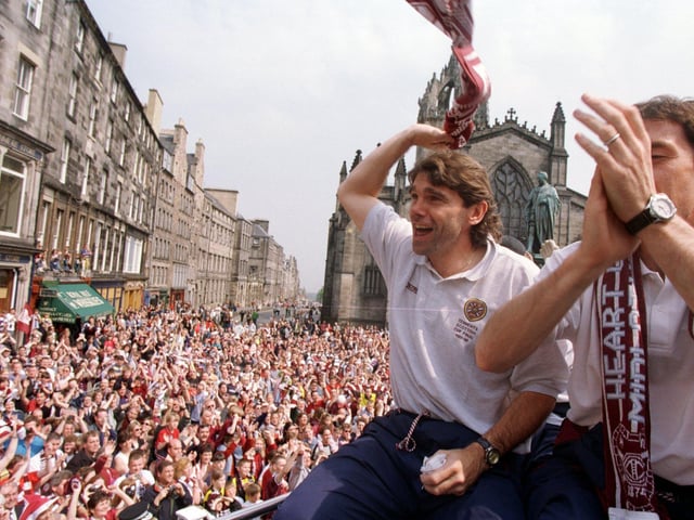 Hearts player Neil Pointon cannot believe the turnout as the Hearts bus sets off on its journey to Tyneacastle to celebrate winning Scottish Cup in 1998.