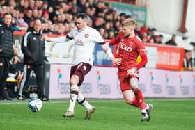 Hearts defender Michael Smith in action against Aberdeen's Hayden Coulson during the last meeting between the clubs. Picture: SNS