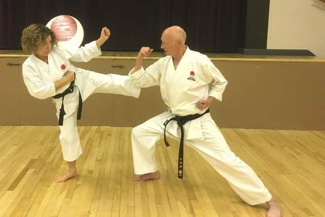 Mike with his karate instructor Paola Burrows