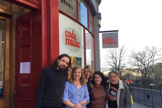 Dougie and the team outside Coda Music.