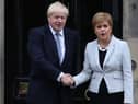 Scotland's First Minister Nicola Sturgeon welcomes Prime Minister Boris Johnson outside Bute House in Edinburgh ahead of their meeting. PRESS ASSOCIATION Photo. Picture date: Monday July 29, 2019. See PA story POLITICS Brexit Scotland. Photo credit should read: Jane Barlow/PA Wire