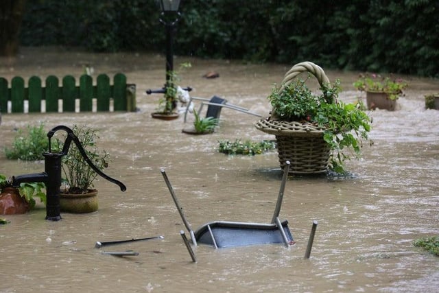 Residents saw their gardens submerged under several feet of floodwater that carried away furniture and plant life in its path.