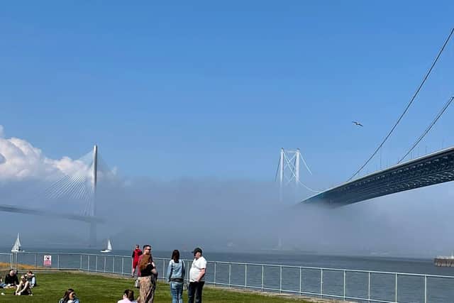 A warm and sunny day by the Queensferry Crossing yesterday afternoon (Saturday May 29) was met with a wall of fog rolling across the Forth bridges as the night closed in.