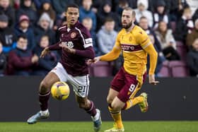 Toby Sibbick in action against Kevin van Veen the last time Hearts and Motherwell faced each other. Picture: SNS