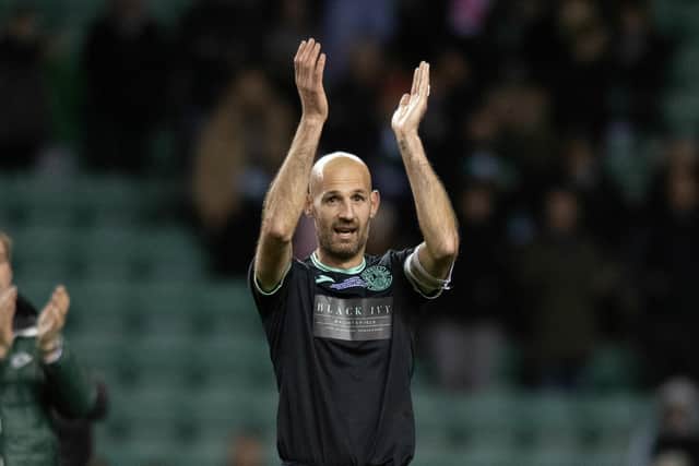 Former Hibs captain and League Cup-winner Rob Jones applauds the fans at full-time of the charity match