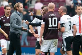 Robbie Neilson and Scott Brown argue at full-time at Tynecastle.