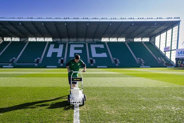 Hibs head groundsman Stevie Thomas works on the Easter Road pitch prior to the renovations