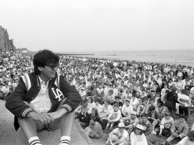 DJ Mike Read and hundreds of children who turned up at Portobello beach for the Radio One Roadshow in July 1987.