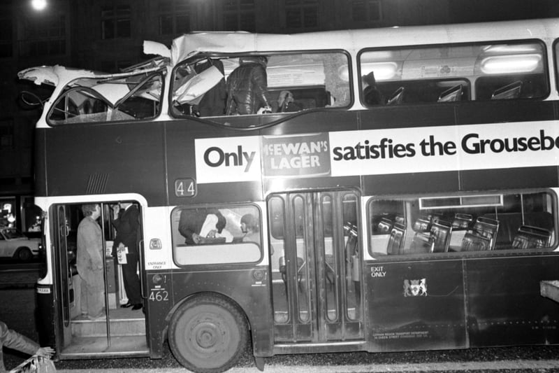 Passengers are stuck upstairs on an Edinburgh bus after it hits a hydraulic platform in Princes Street, smashing in the roof of the bus and bringing down the Christmas decorations in January 1980.