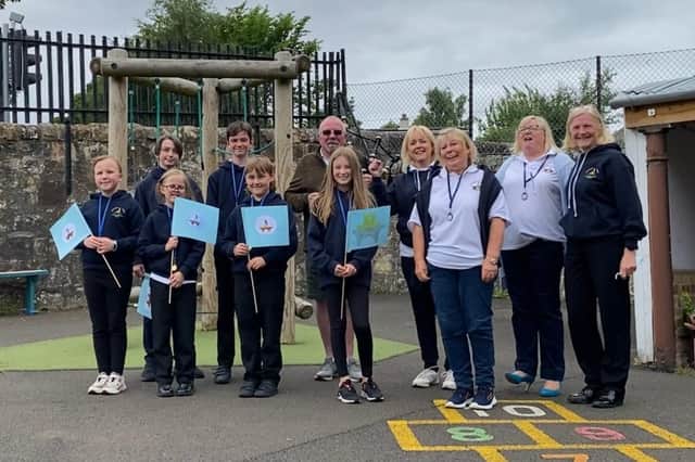 Parents, pupils and staff mark the closure of Glencorse Primary School.