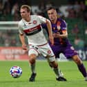 Calem Nieuwenhof in action for Western Sydney Wanderers against former Hearts midfielder Aaron McEneff during an A-League match against Perth Glory. Picture: Getty