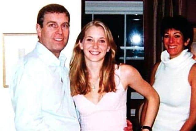 Picture reportedly showing Prince Andrew, Virginia Roberts, aged 17, and Ghislaine Maxwell at Maxwell's townhouse in London, Britain on March 13 2001.