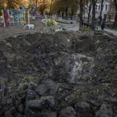 A crater left by a Russian missile strike on a playground in Taras Shevchenko Park in Kyiv, Ukraine (Picture: Ed Ram/Getty Images)