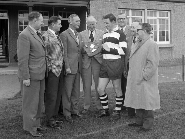 Royal High School FP receiving the Edinburgh and District Rugby clubs knock-out tournament trophy in October 1964.