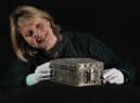 Dr Anna Groundwater, principal Curator at the the National Museum Scotland, with a rare French silver casket believed to have belonged to Mary Queen of Scots. Picture: Stewart Attwood