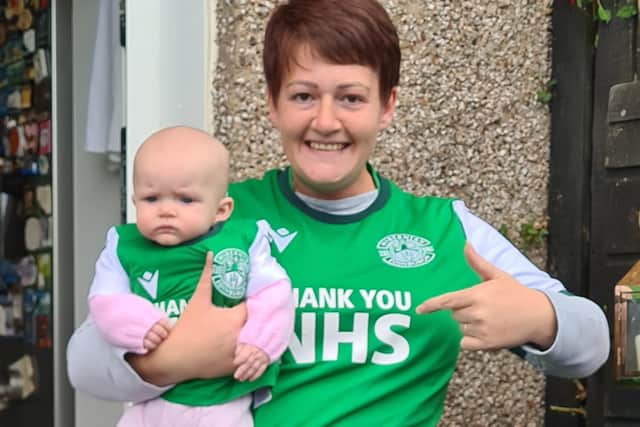 Catriona Meachan in her Hibs top with baby Matilda.