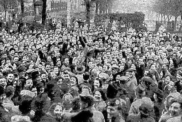 Led by a vigorous conductor, Edinburgh VE Day celebrators join in singing 'The End of the Road', May 1945.