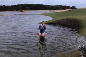 North Berwick Golf Club's Lady Captain Yvonne Keeling took a swim in the flooded area on the ninth hole. Picture: North Berwick Golf Club
