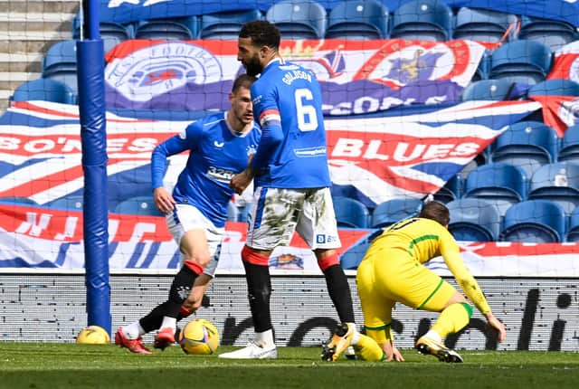 Martin Boyle goes down under this challenge from Connor Goldson.