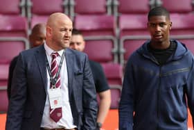 Hearts sporting director Joe Savage and Odeluga Offiah at Tynecastle. Pic: SNS