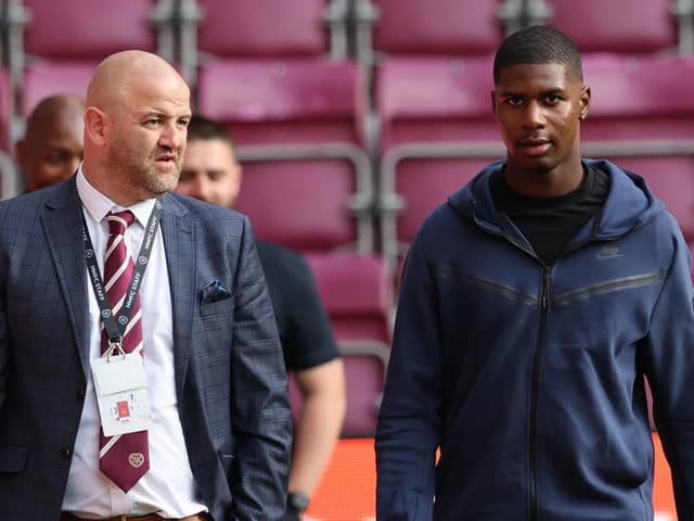 Hearts sporting director Joe Savage and Odeluga Offiah at Tynecastle. Pic: SNS
