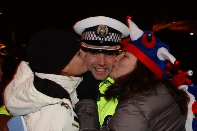 On Hogmanay 2002, one Edinburgh police officer was lucky enough to receive two New Year's kisses at the same time!